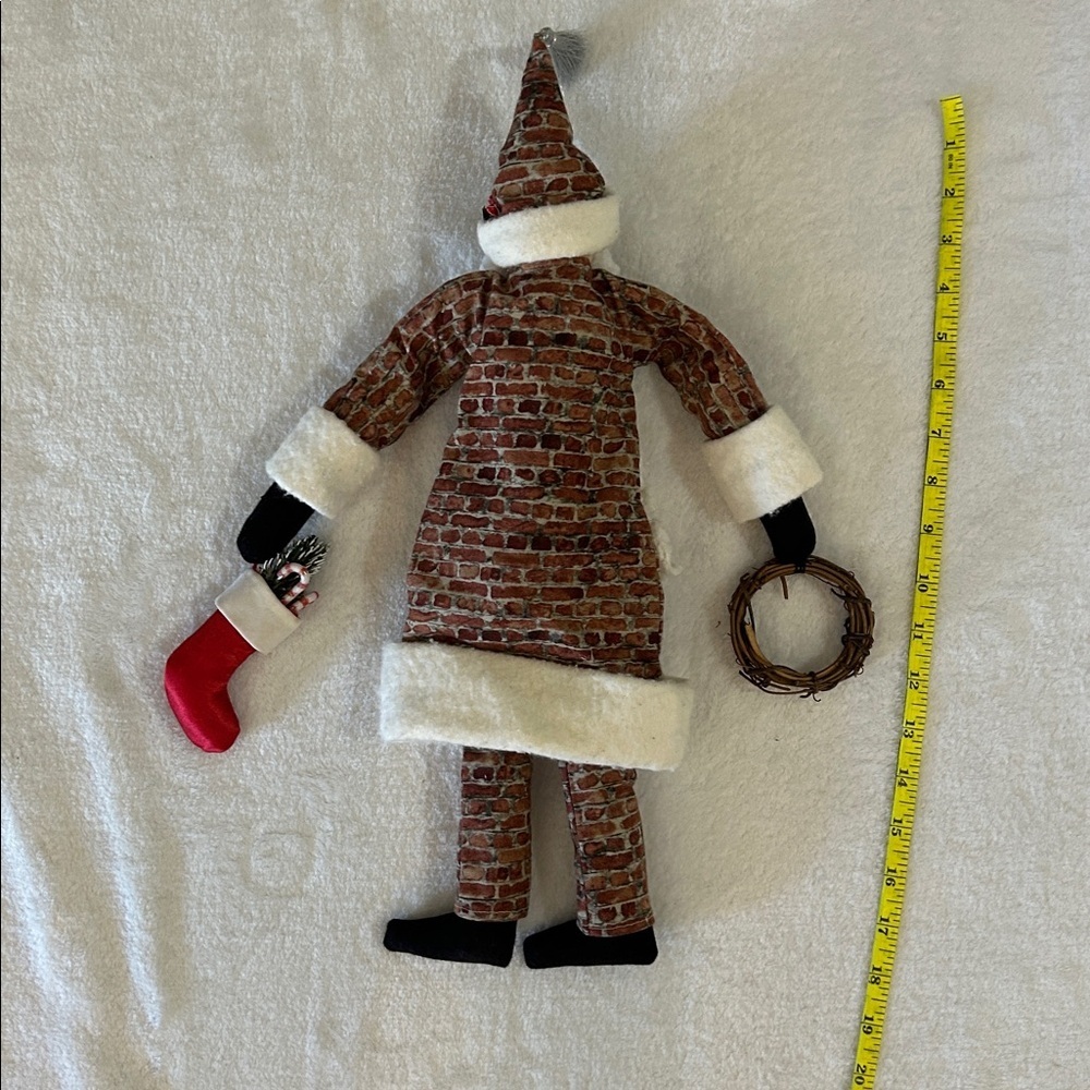Festive Santa Claus Plush with Wreath and Stocking - Picture 8 of 9